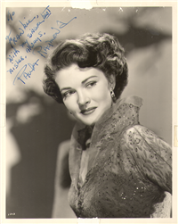 PAULA RAYMOND (American model, actress, 1924 - 2003) Signed 8x10 publicity photo circa 1950s