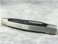 1995 Buck USA 303 Black Sawcut Cadet Stockman