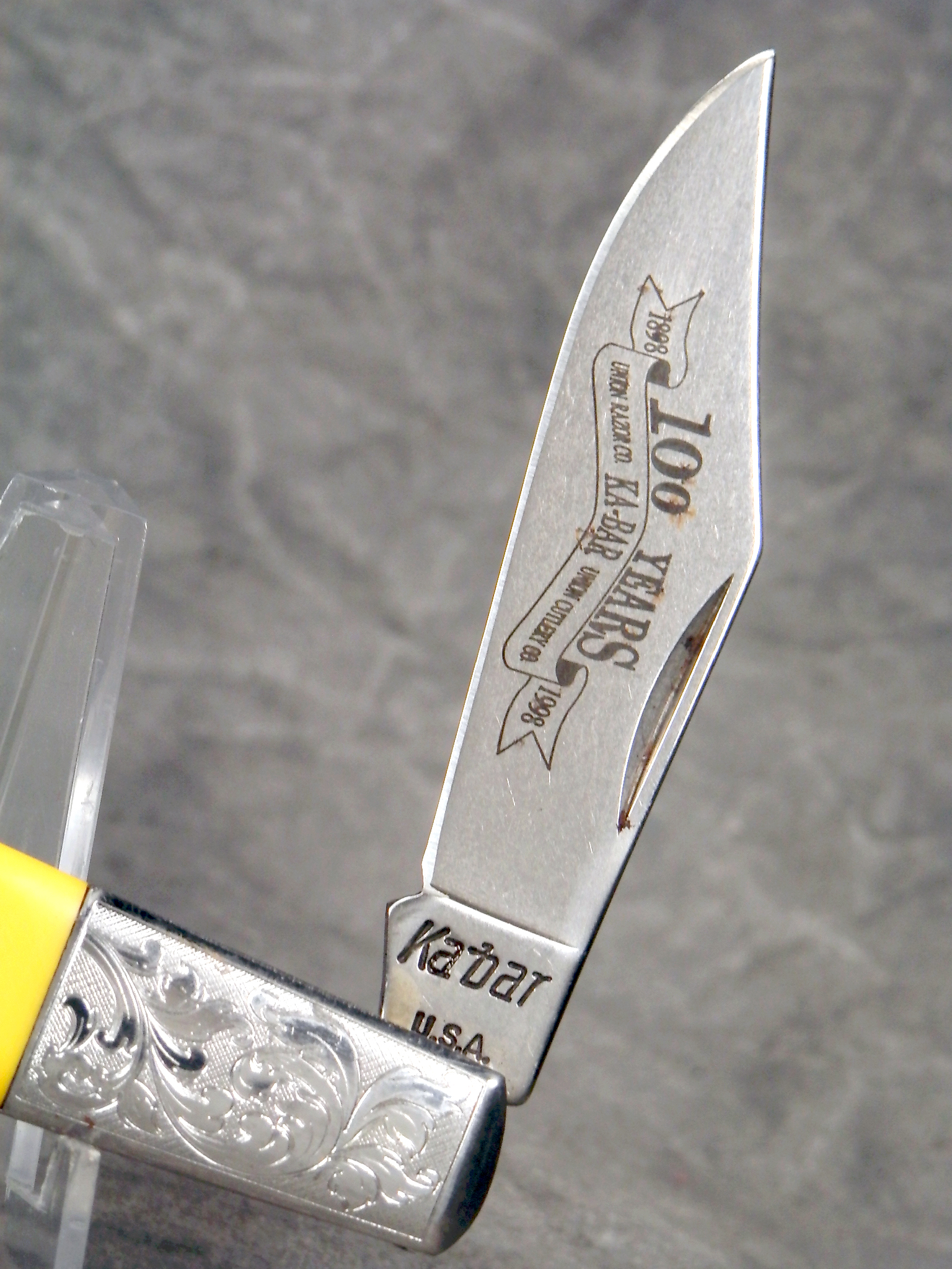 How much is 1998 KABAR Yellow Sawcut 100th Anniversary Barlow worth