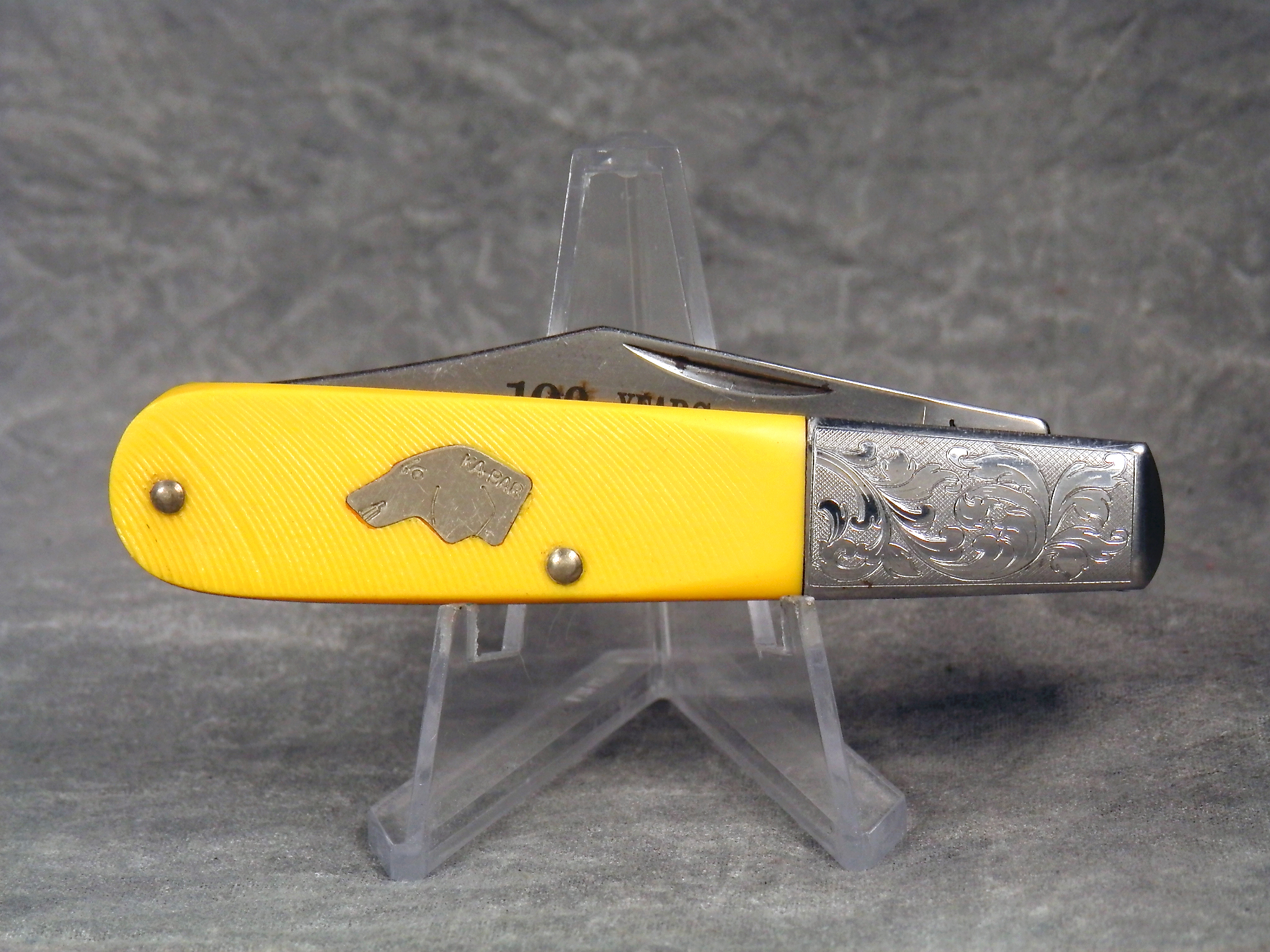 How much is 1998 KABAR Yellow Sawcut 100th Anniversary Barlow worth