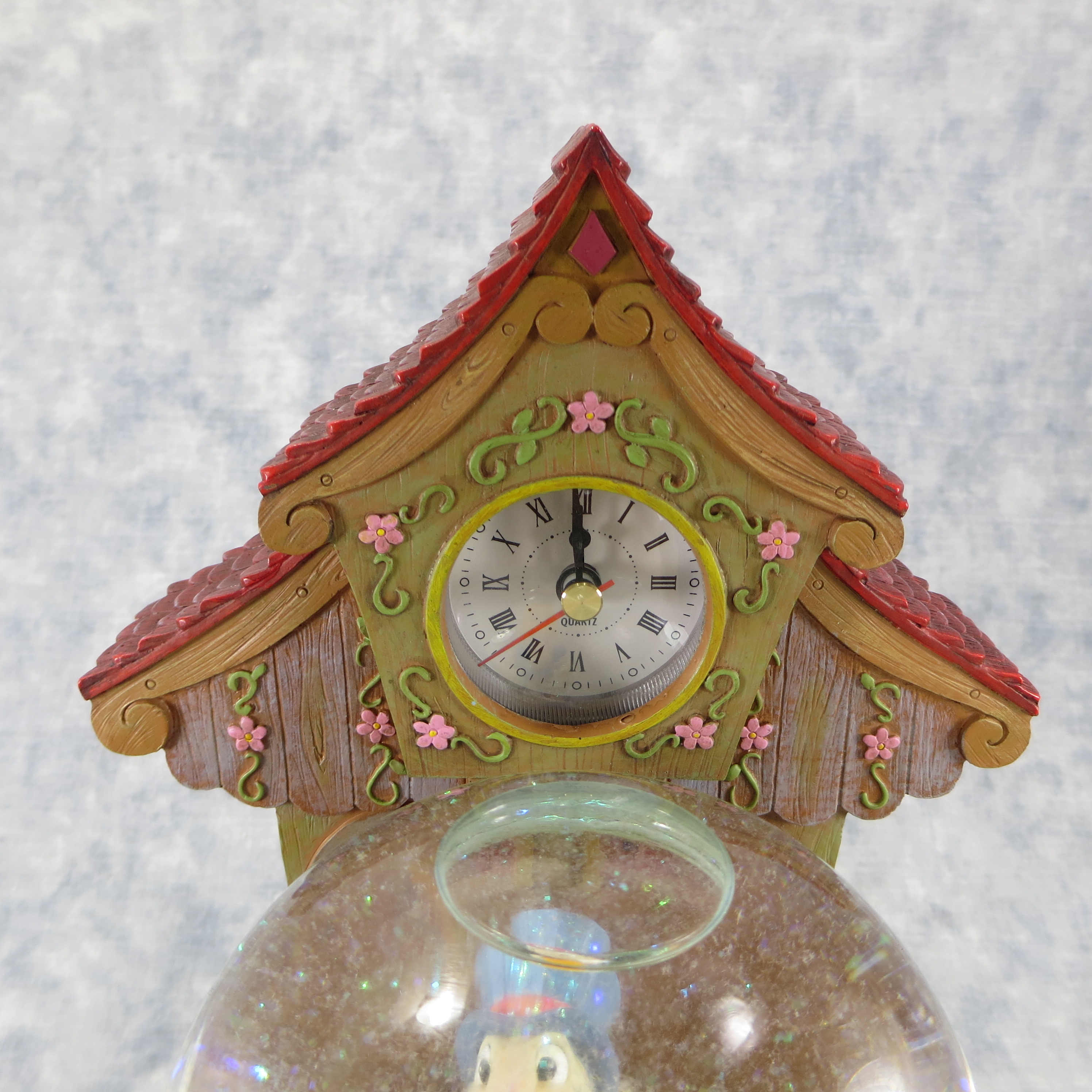 Jiminy Cricket globe 2024 music clock