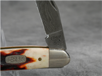 1998 CASE XX USA Burnt Red Stag Damascus Muskrat