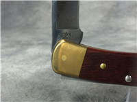 2004 BUCK 110 SP73 "Alaskan Guide" Wood Lockback  with Leather Sheath