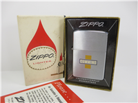 CUMMINS ENGINES Yellow Cross Logo Brushed Chrome Advertising Lighter (Zippo, 1963)