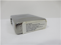 ONE WORLD ONE FUTURE Titanium Millennium Edition Lighter (Spanish Booklet) in Collectors Tin (Zippo, 1999)