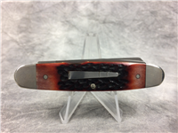 2015 REMINGTON UMC R4466 Amber Jigged Bone Cliffhanger Bullet Knife