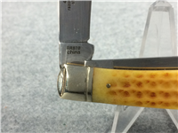 ROUGH RIDER RR870 Yellow Jigged Bone Trapper Knife & Flask in Barrel Box