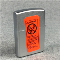 ZIPPO MERRY CHRISTMAS ICE SKATING PENGUIN Satin Chrome Lighter (Zippo, 2001)