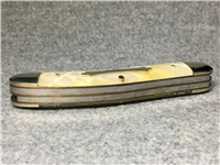 1997 FIGHT'N ROOSTER White celluloid handle with diamond pattern HEAVENS GATE Stockman